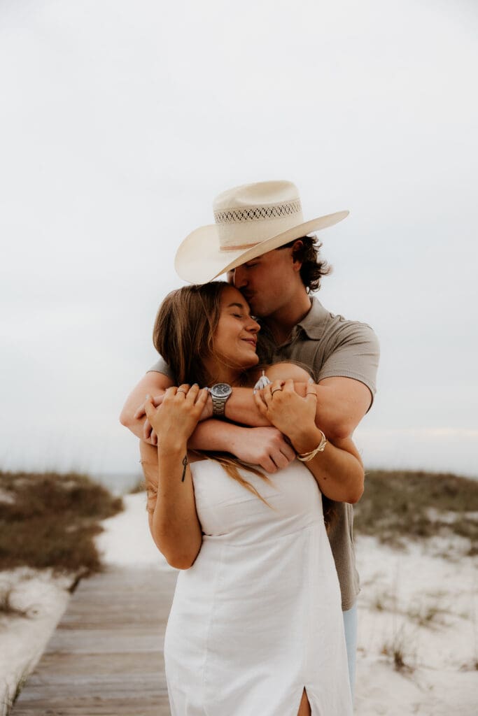 Photograph of couples portraits on Orange Beach in Orange Beach, Alabama.