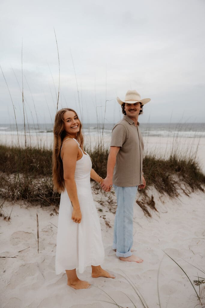 Photograph of couples portraits on Orange Beach in Orange Beach, Alabama.