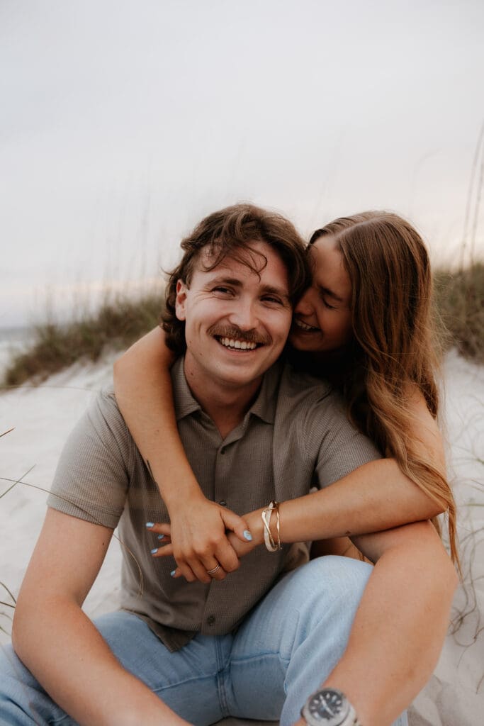 Photograph of couples portraits on Orange Beach in Orange Beach, Alabama.