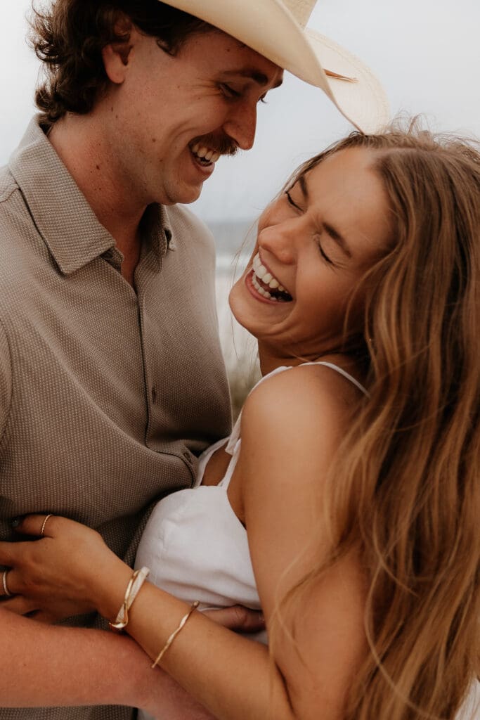 Photograph of couples portraits on Orange Beach in Orange Beach, Alabama.