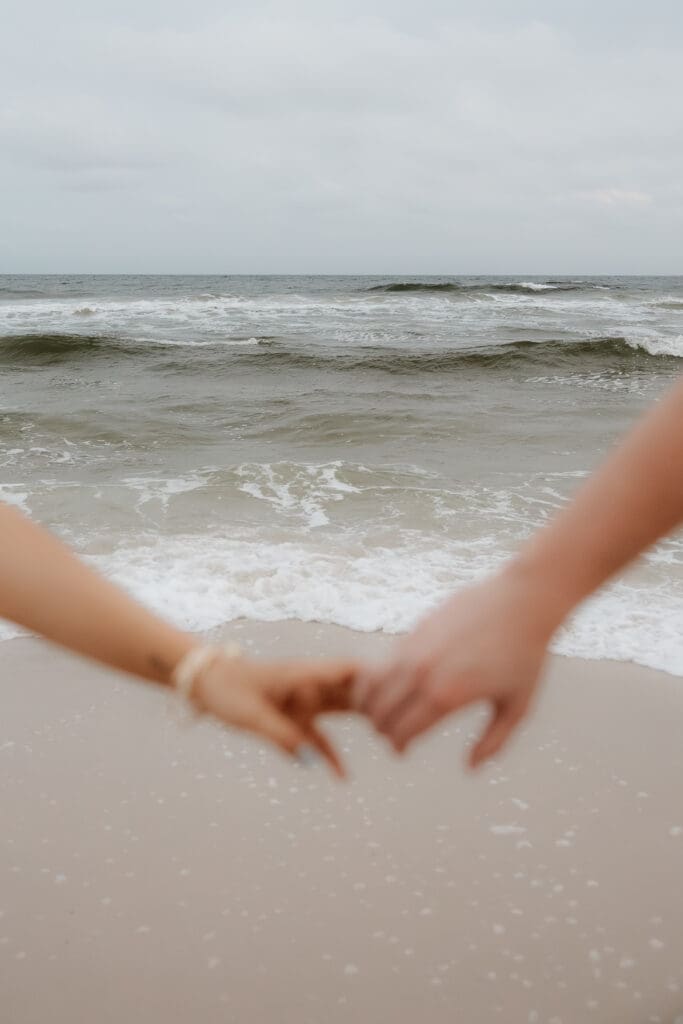 Photograph of couples portraits on Orange Beach in Orange Beach, Alabama.