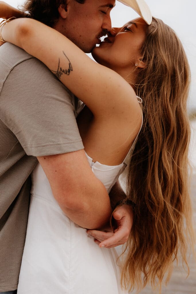 Photograph of couples portraits on Orange Beach in Orange Beach, Alabama.
