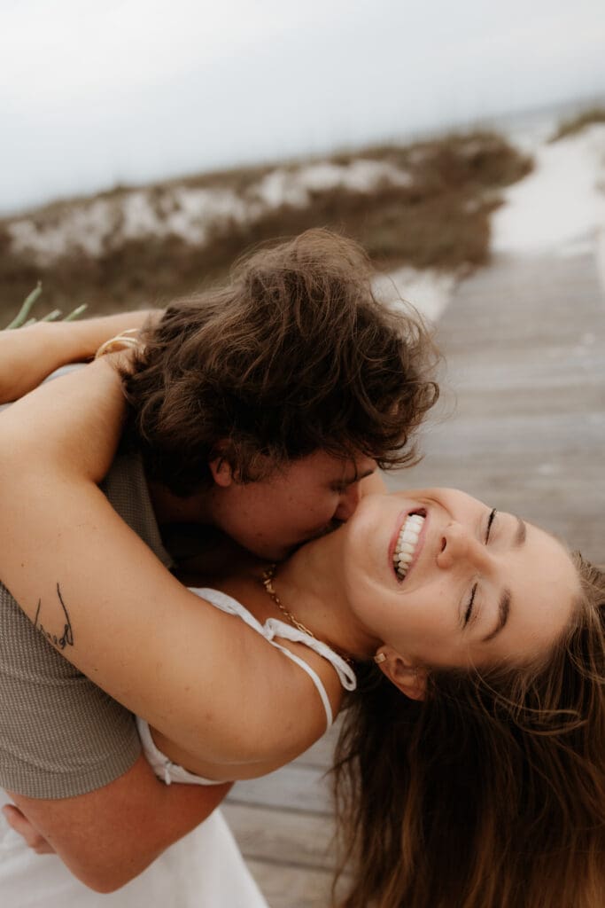 Photograph of couples portraits on Orange Beach in Orange Beach, Alabama.