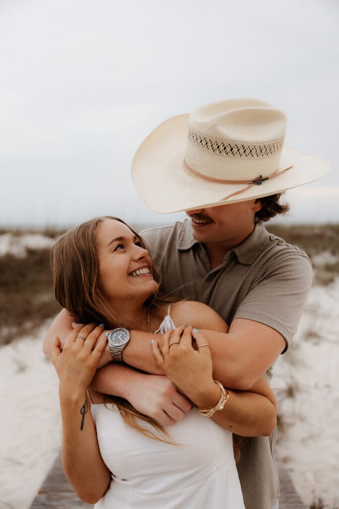 Photograph of couples portraits on Orange Beach in Orange Beach, Alabama.