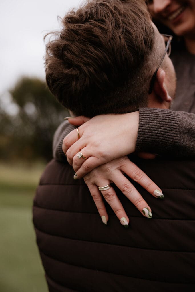 Photograph of engagement portraits at Hiawatha Golf Course in Minneapolis Minnesota.