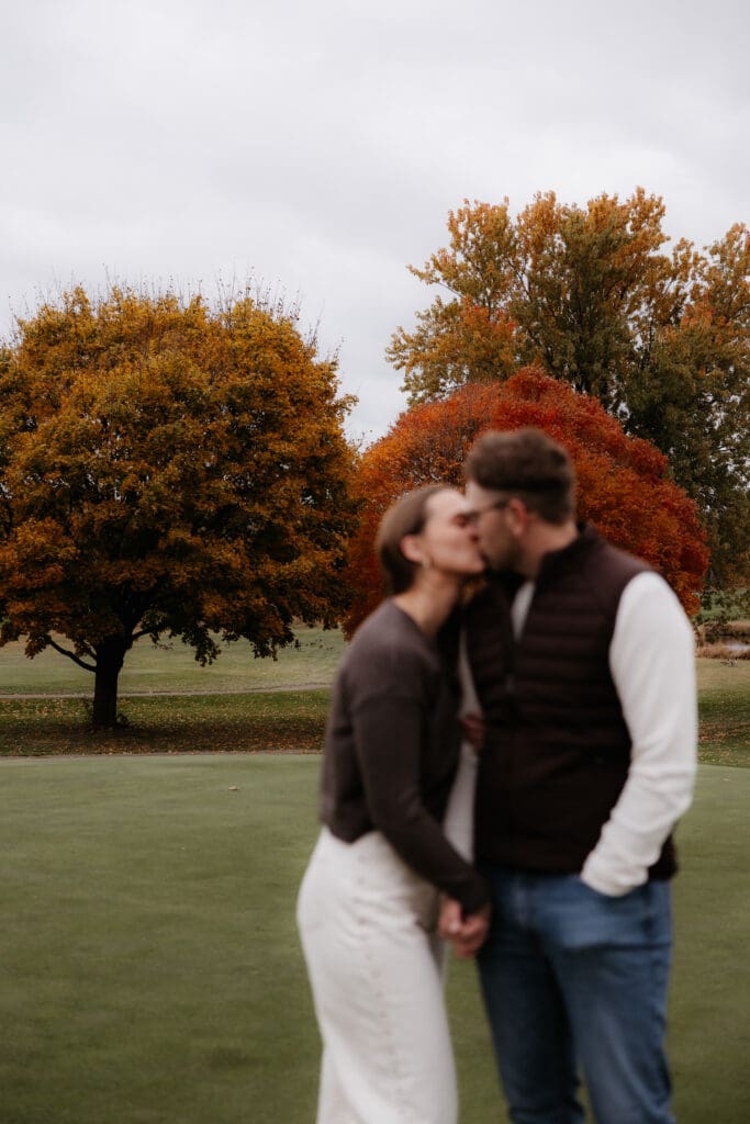 Photograph of engagement portraits at Hiawatha Golf Course in Minneapolis Minnesota.