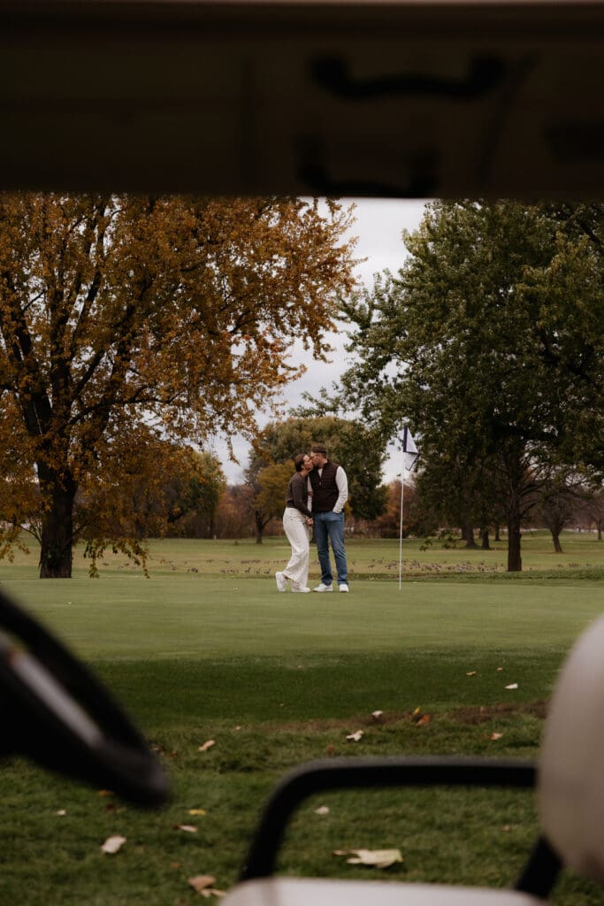 Photograph of engagement portraits at Hiawatha Golf Course in Minneapolis Minnesota.