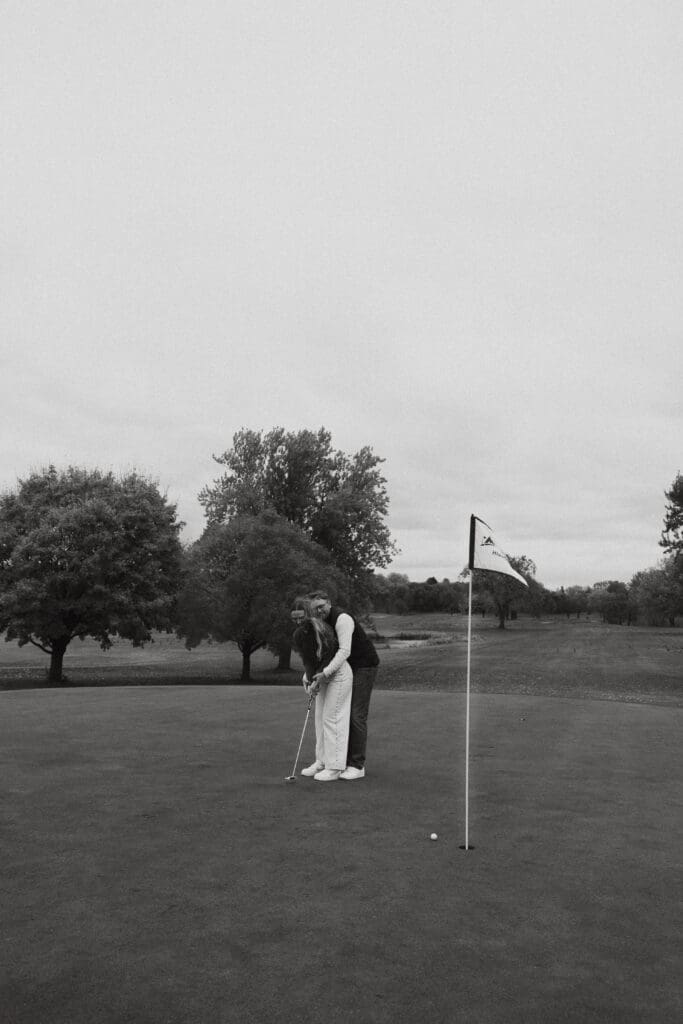 Photograph of engagement portraits at Hiawatha Golf Course in Minneapolis Minnesota.