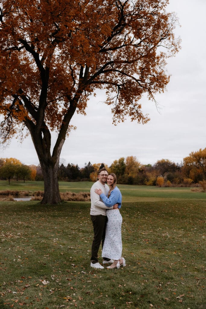 Photograph of engagement portraits at Hiawatha Golf Course in Minneapolis Minnesota.