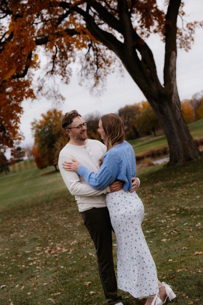 Photograph of engagement portraits at Hiawatha Golf Course in Minneapolis Minnesota.