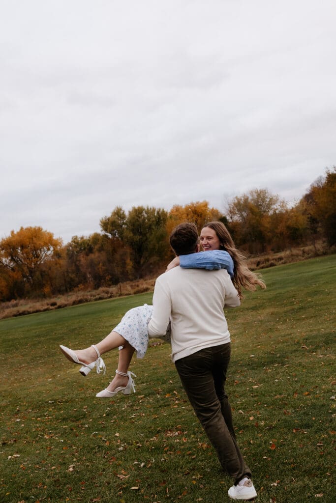 Photograph of engagement portraits at Hiawatha Golf Course in Minneapolis Minnesota.