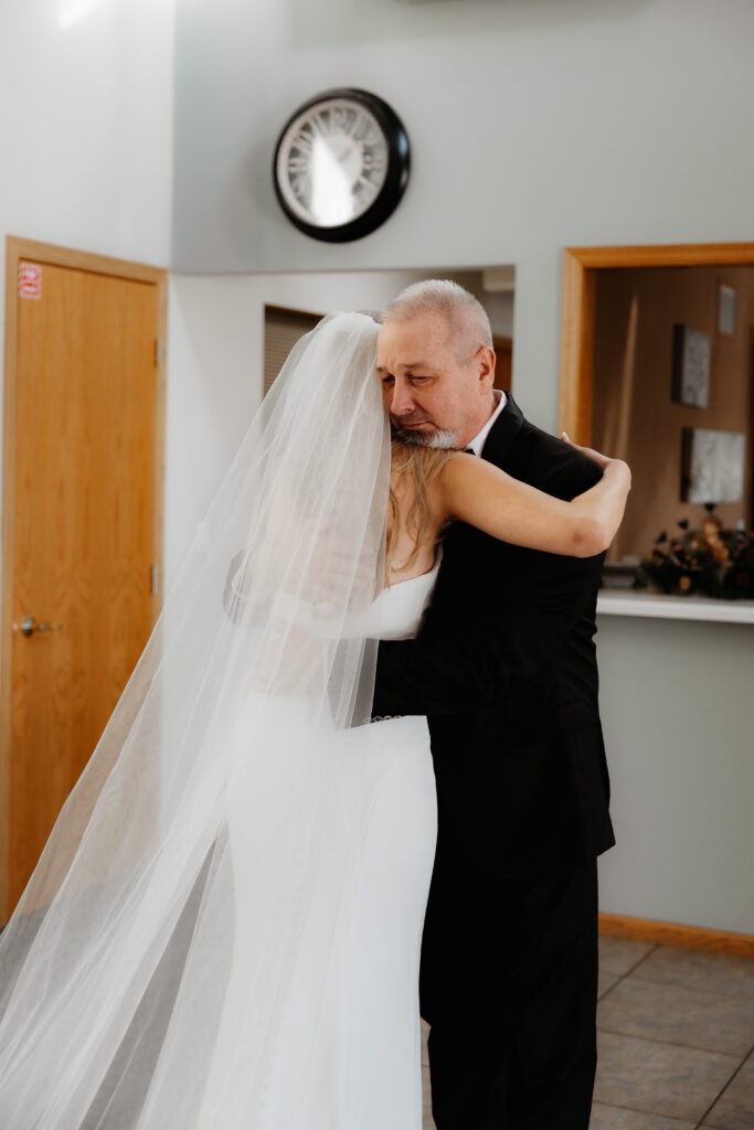 Photograph of a winter wedding at the Tenstrike Community Church in Bemidji, Minnesota by Minnesota wedding photographer and videographer, Alyssa Thompson Media.
