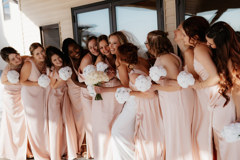 Photograph of a winter wedding at the Tenstrike Community Church in Bemidji, Minnesota by Minnesota wedding photographer and videographer, Alyssa Thompson Media.