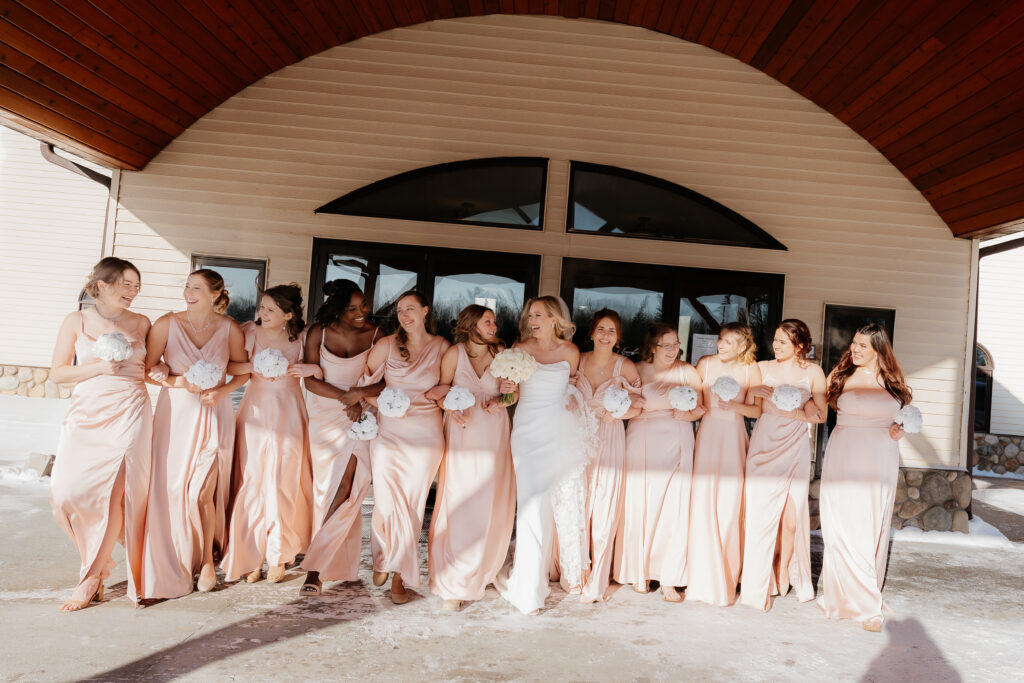 Photograph of a winter wedding at the Tenstrike Community Church in Bemidji, Minnesota by Minnesota wedding photographer and videographer, Alyssa Thompson Media.