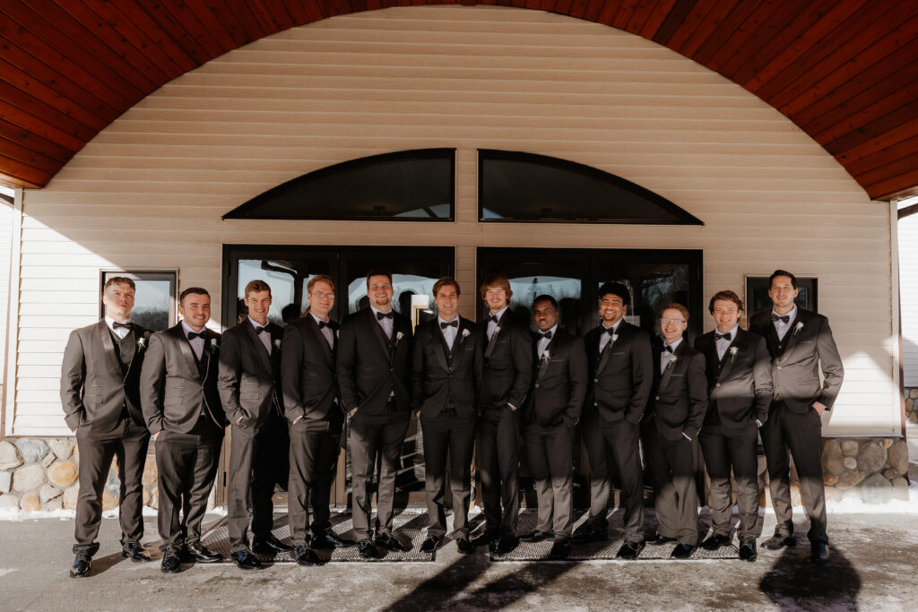 Photograph of a winter wedding at the Tenstrike Community Church in Bemidji, Minnesota by Minnesota wedding photographer and videographer, Alyssa Thompson Media.