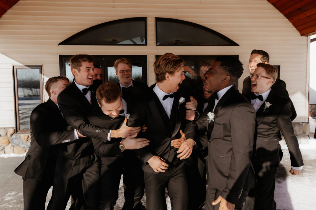Photograph of a winter wedding at the Tenstrike Community Church in Bemidji, Minnesota by Minnesota wedding photographer and videographer, Alyssa Thompson Media.