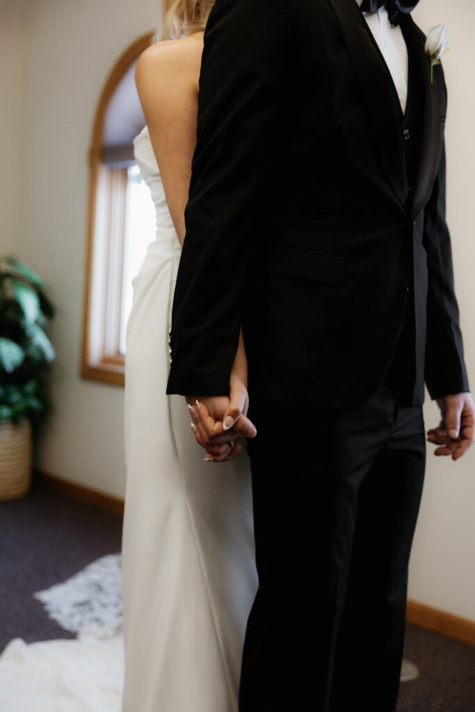 Photograph of a winter wedding at the Tenstrike Community Church in Bemidji, Minnesota by Minnesota wedding photographer and videographer, Alyssa Thompson Media.
