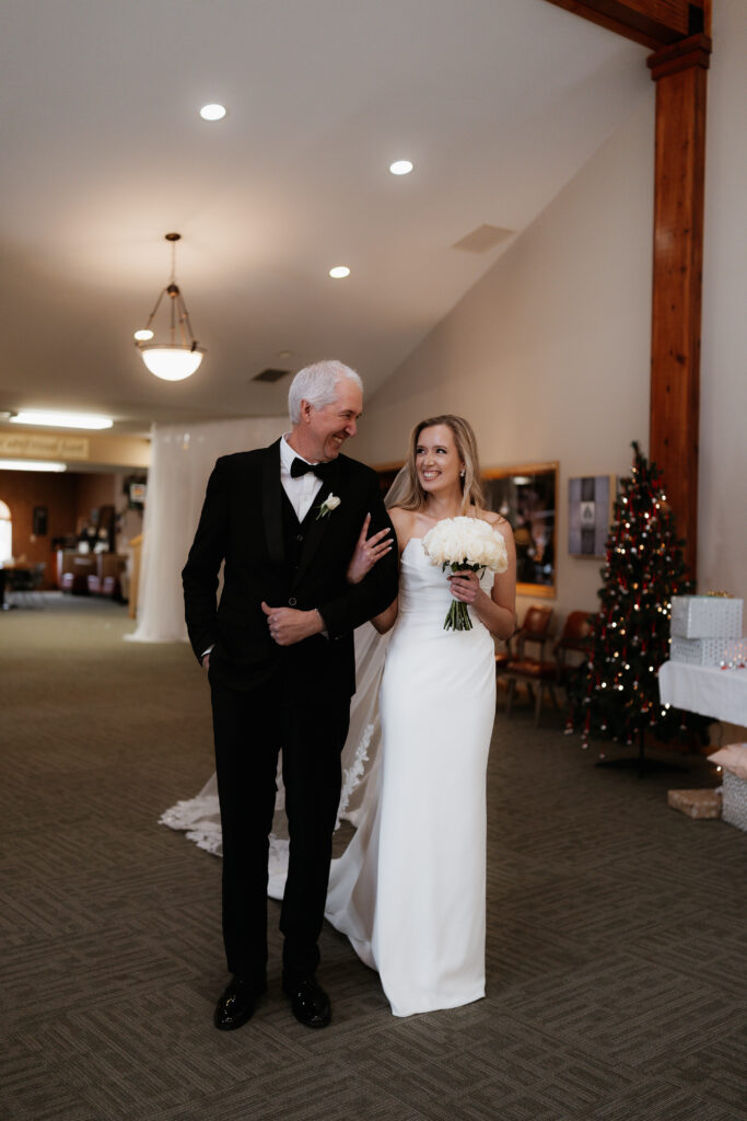 Photograph of a winter wedding at the Tenstrike Community Church in Bemidji, Minnesota by Minnesota wedding photographer and videographer, Alyssa Thompson Media.