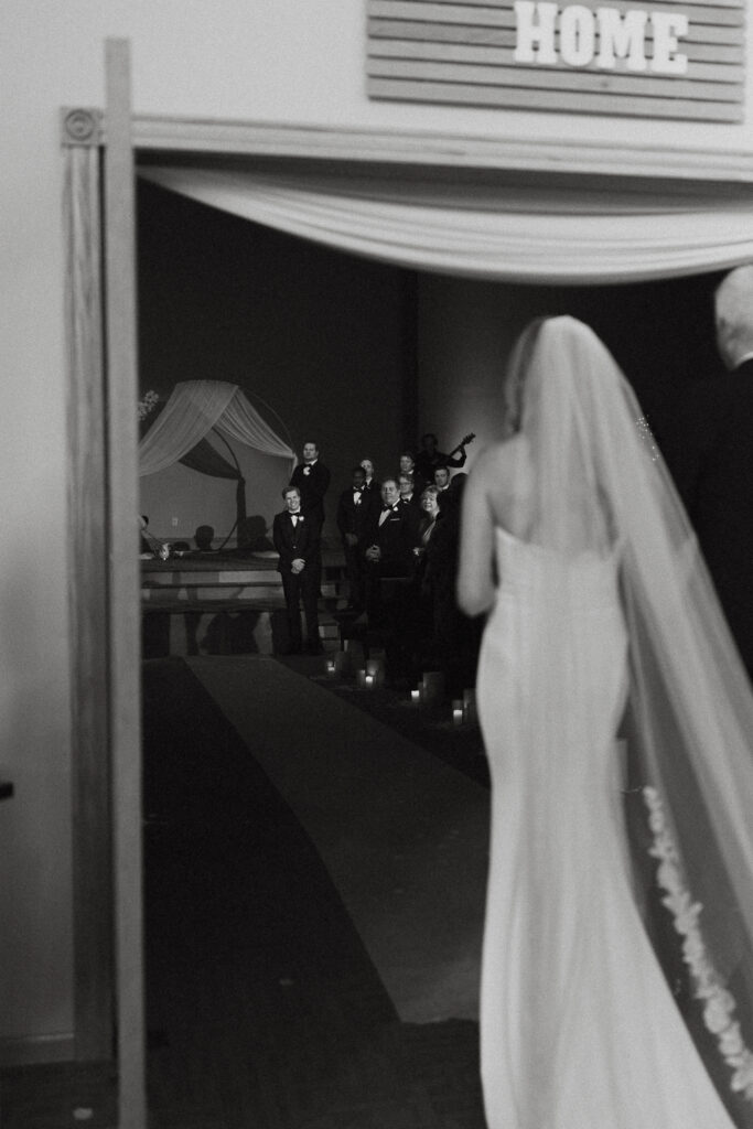 Photograph of a winter wedding at the Tenstrike Community Church in Bemidji, Minnesota by Minnesota wedding photographer and videographer, Alyssa Thompson Media.