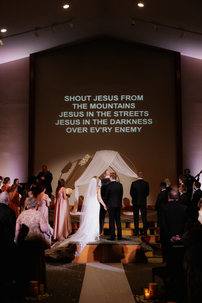 Photograph of a winter wedding at the Tenstrike Community Church in Bemidji, Minnesota by Minnesota wedding photographer and videographer, Alyssa Thompson Media.