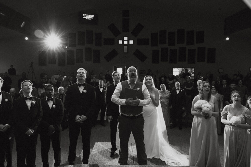 Photograph of a winter wedding at the Tenstrike Community Church in Bemidji, Minnesota by Minnesota wedding photographer and videographer, Alyssa Thompson Media.