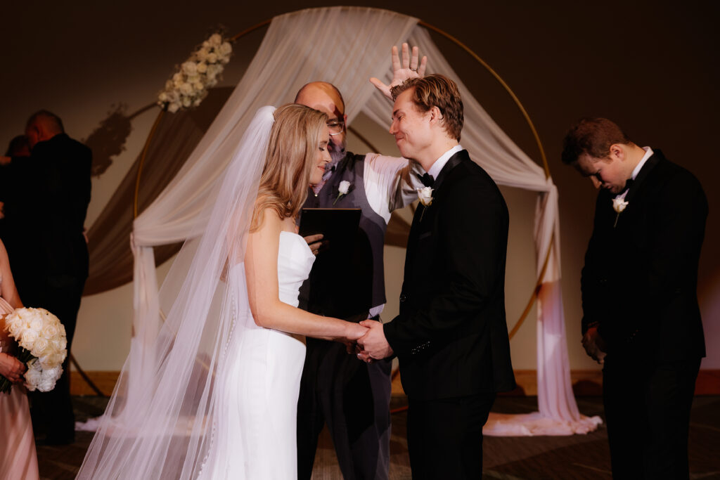 Photograph of a winter wedding at the Tenstrike Community Church in Bemidji, Minnesota by Minnesota wedding photographer and videographer, Alyssa Thompson Media.