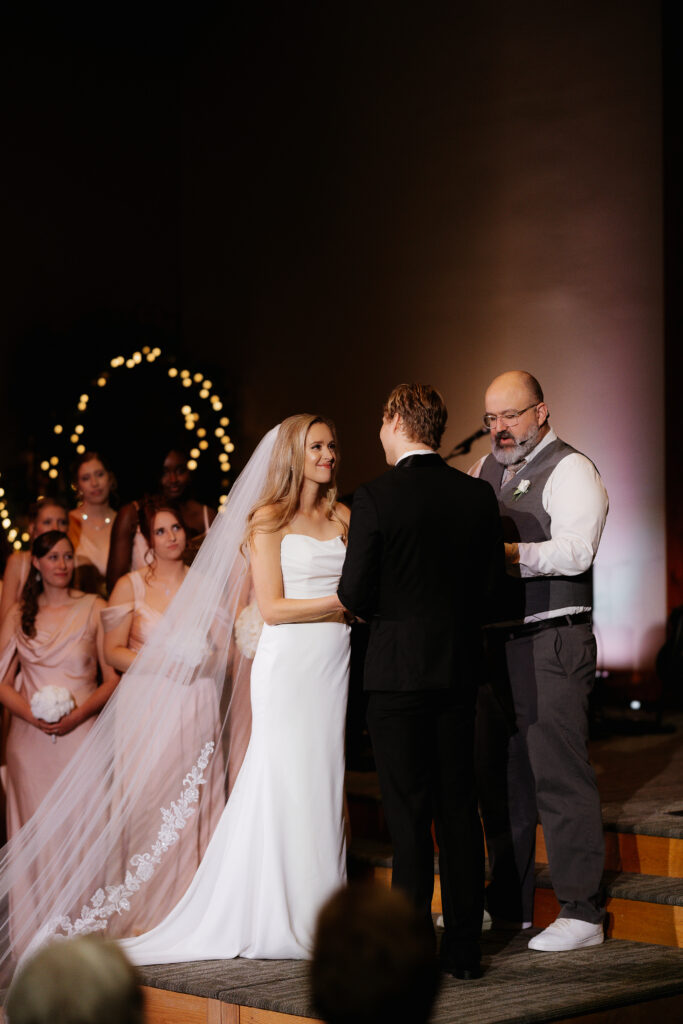Photograph of a winter wedding at the Tenstrike Community Church in Bemidji, Minnesota by Minnesota wedding photographer and videographer, Alyssa Thompson Media.