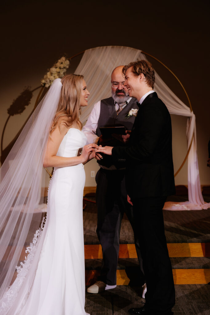 Photograph of a winter wedding at the Tenstrike Community Church in Bemidji, Minnesota by Minnesota wedding photographer and videographer, Alyssa Thompson Media.