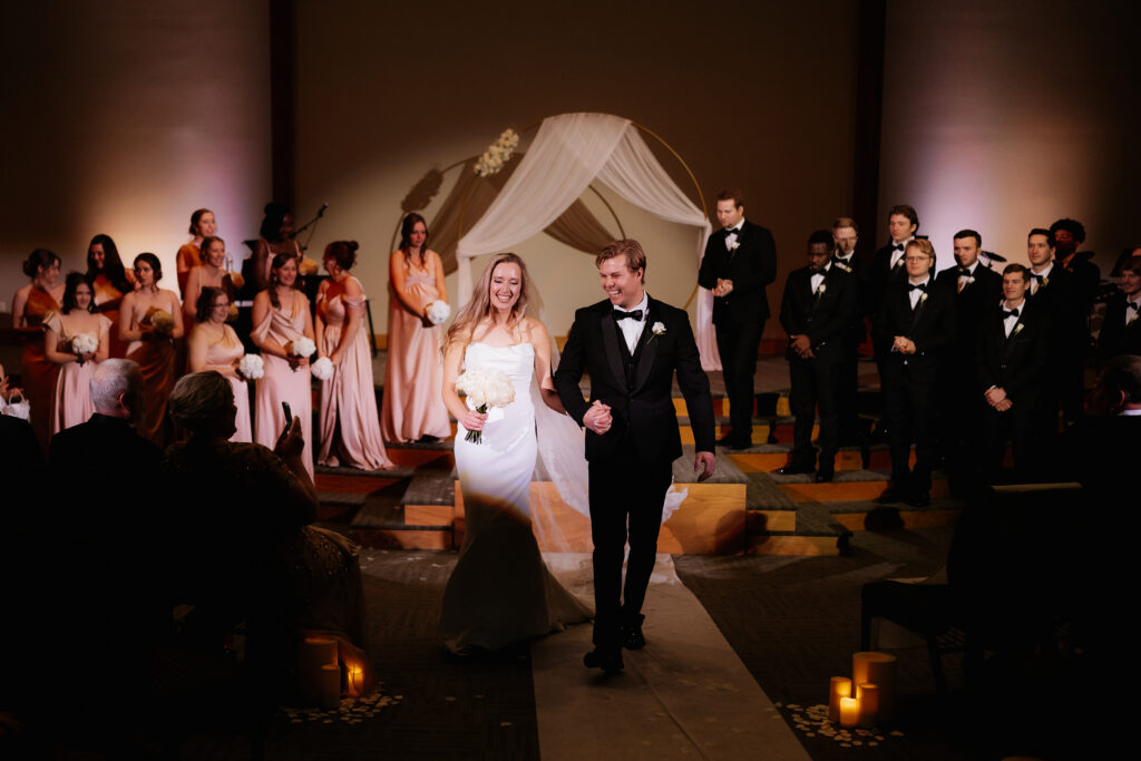 Photograph of a winter wedding at the Tenstrike Community Church in Bemidji, Minnesota by Minnesota wedding photographer and videographer, Alyssa Thompson Media.