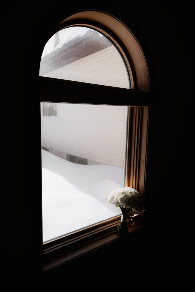Photograph of a winter wedding at the Tenstrike Community Church in Bemidji, Minnesota by Minnesota wedding photographer and videographer, Alyssa Thompson Media.