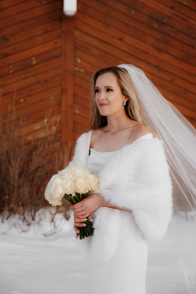 Photograph of a winter wedding at the Tenstrike Community Church in Bemidji, Minnesota by Minnesota wedding photographer and videographer, Alyssa Thompson Media.
