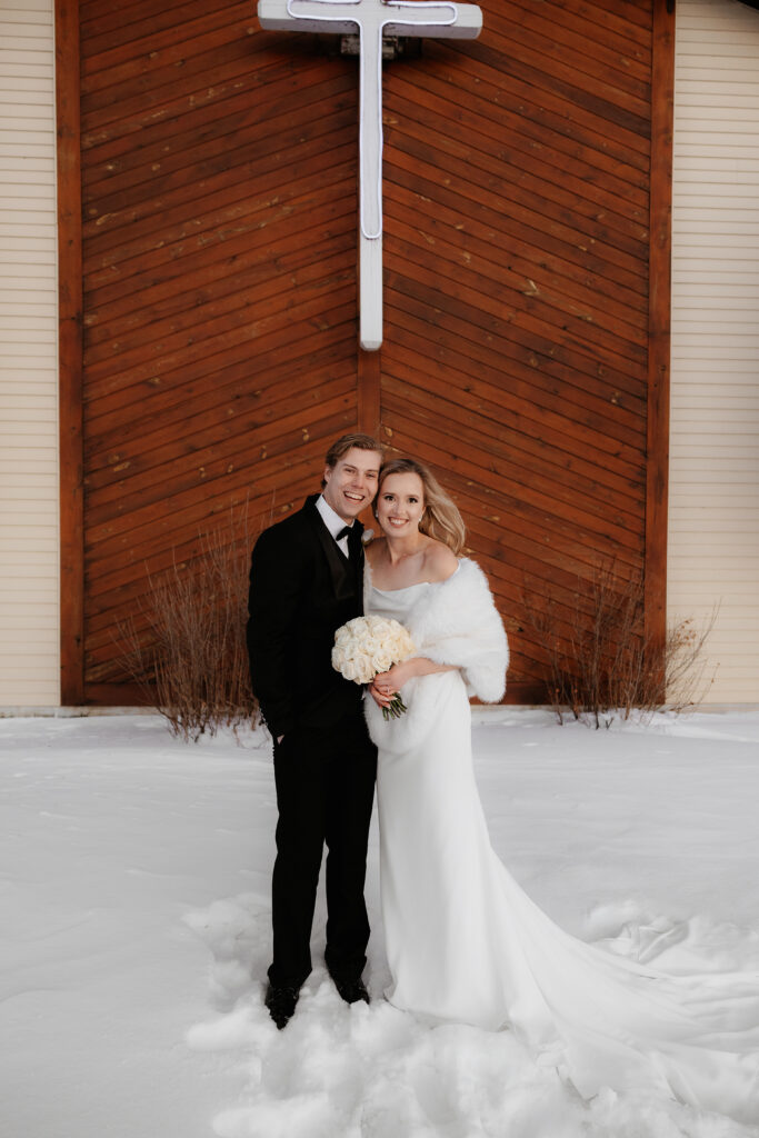 Photograph of a winter wedding at the Tenstrike Community Church in Bemidji, Minnesota by Minnesota wedding photographer and videographer, Alyssa Thompson Media.