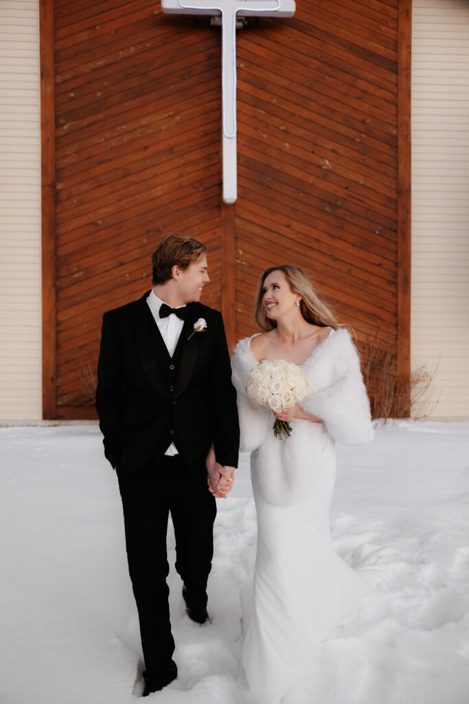 Photograph of a winter wedding at the Tenstrike Community Church in Bemidji, Minnesota by Minnesota wedding photographer and videographer, Alyssa Thompson Media.