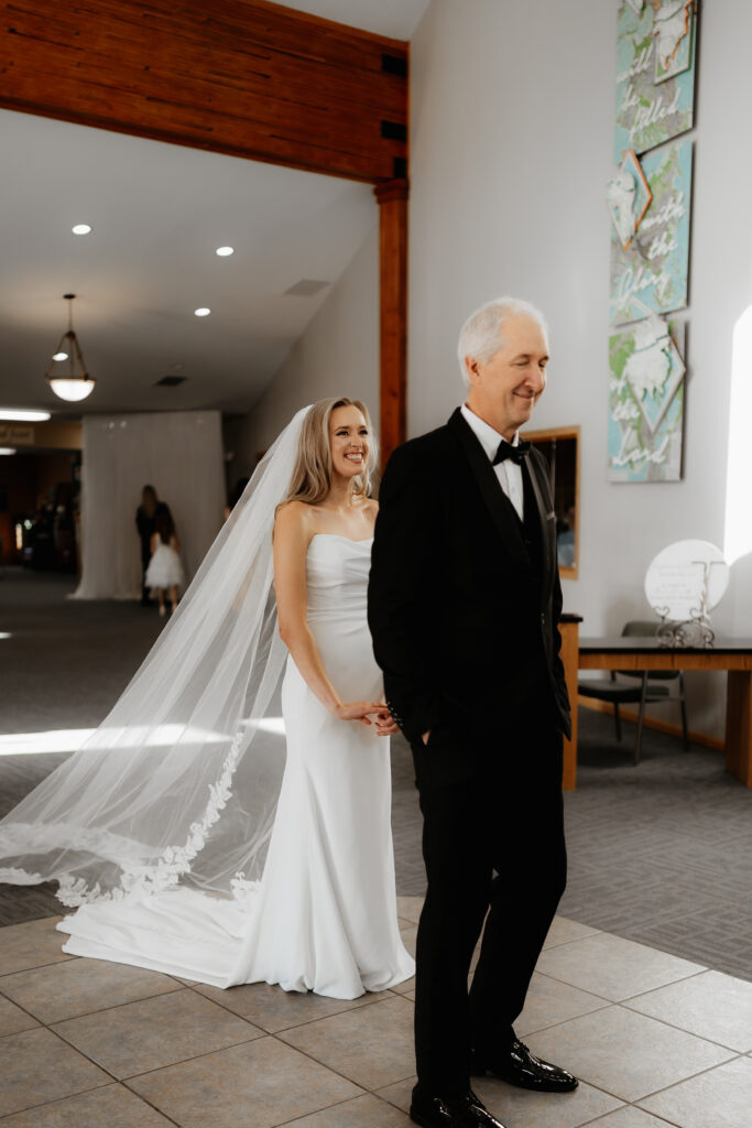 Photograph of a winter wedding at the Tenstrike Community Church in Bemidji, Minnesota by Minnesota wedding photographer and videographer, Alyssa Thompson Media.