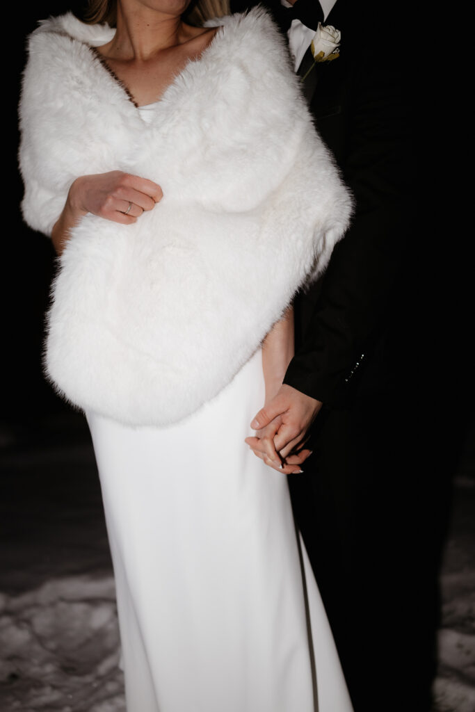 Photograph of a winter wedding at the Tenstrike Community Church in Bemidji, Minnesota by Minnesota wedding photographer and videographer, Alyssa Thompson Media.