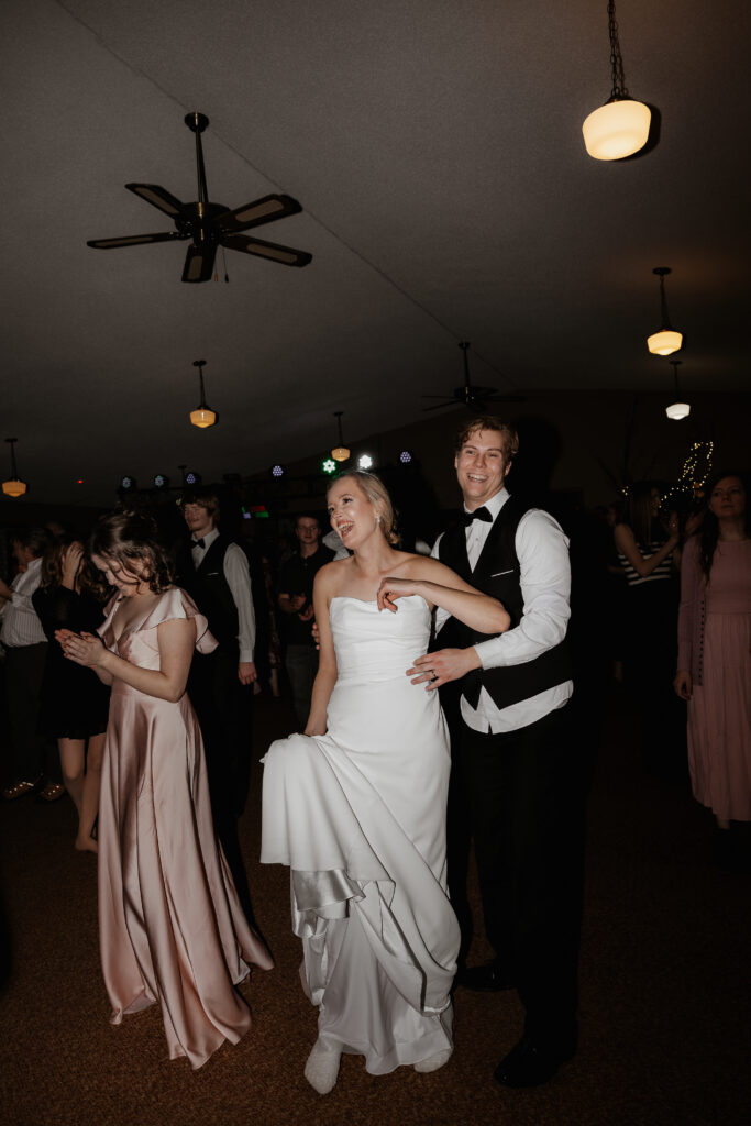 Photograph of a winter wedding at the Tenstrike Community Church in Bemidji, Minnesota by Minnesota wedding photographer and videographer, Alyssa Thompson Media.